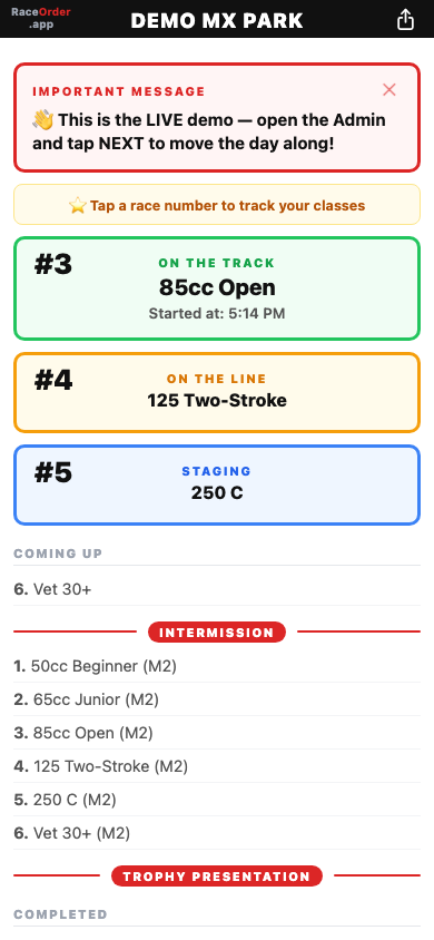 RaceOrder demo spectator board showing 85cc Open on the track, 125 Two-Stroke on the line, and 250 C staging. Sample data, not a Meadowlarks event.